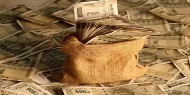 A bag of money on a table AI-generated content may be incorrect.
